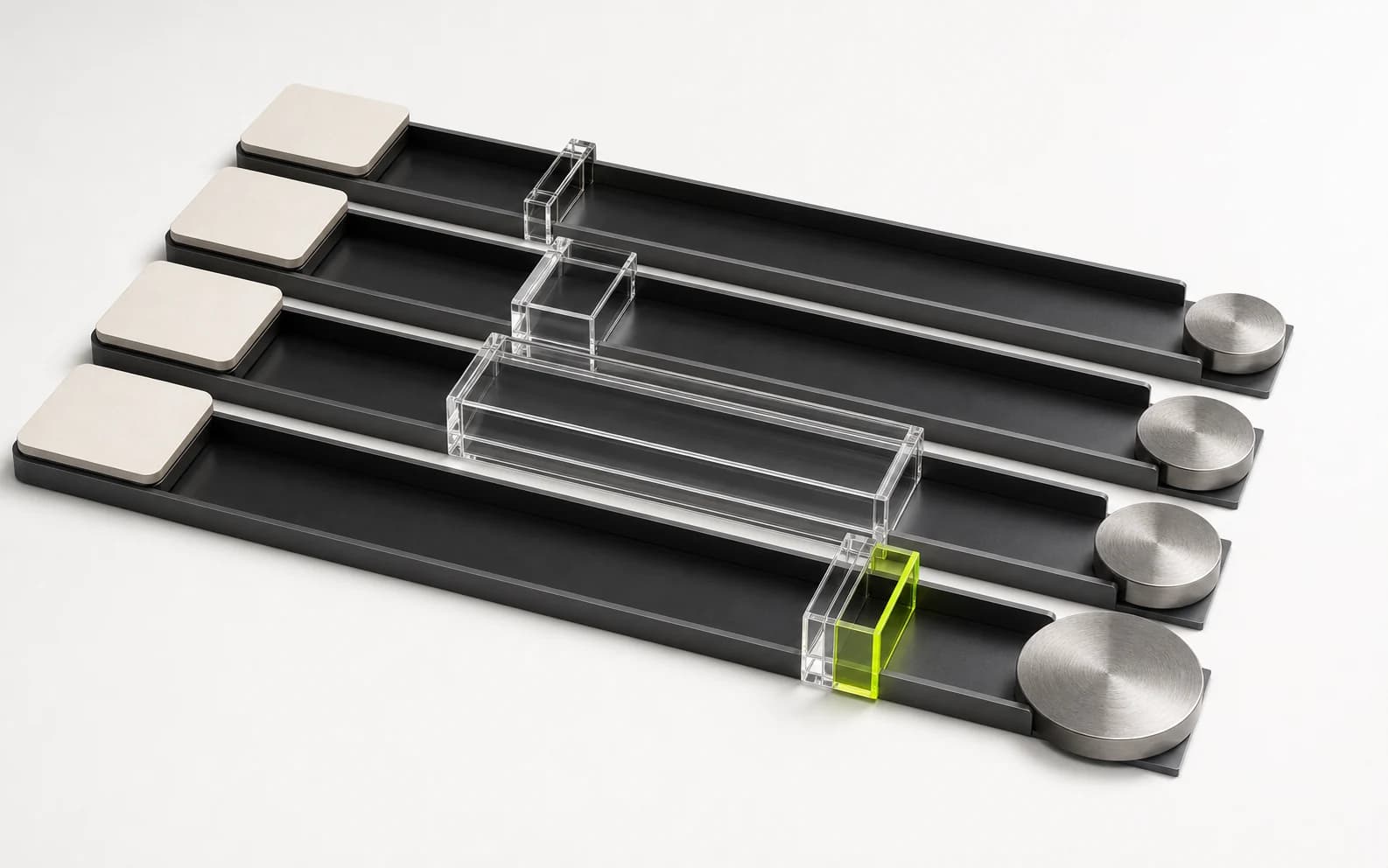Four parallel payout channels pass identical clip tiles through different restrictions toward metal payout pucks.