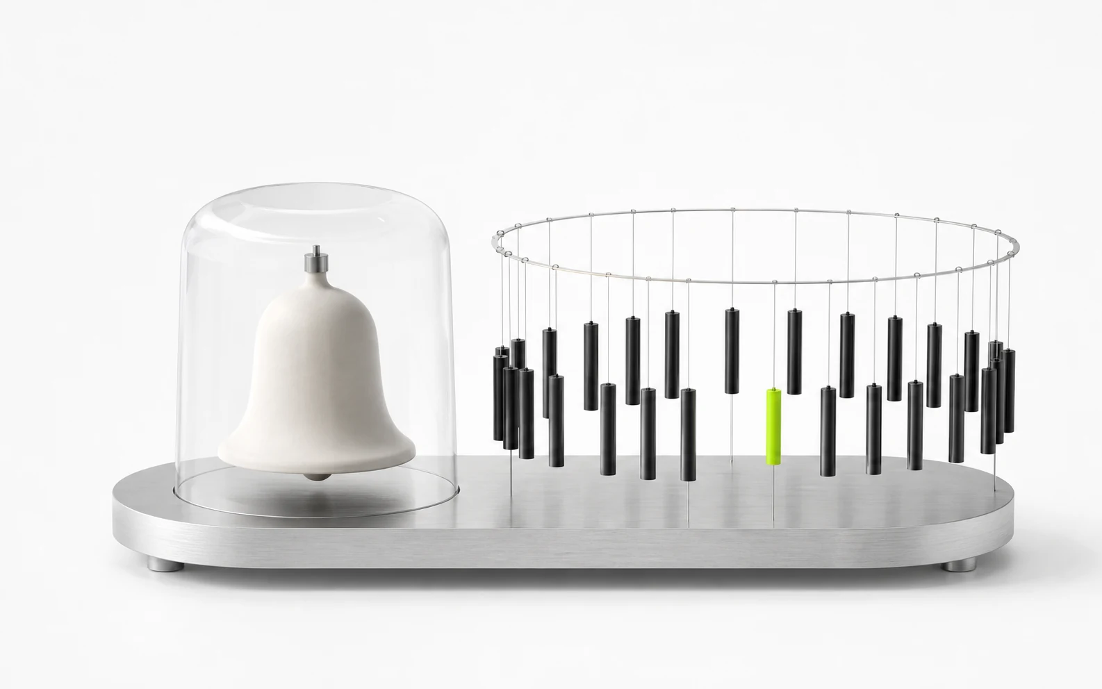 A large white ceramic bell under a clear hood sits beside a ring of many small black chimes with one lime resonator.