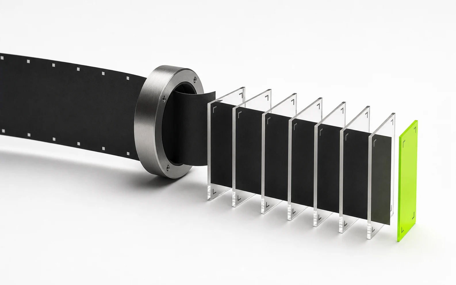 A black source strip passes through a steel cutting ring and separates into seven upright clip plates, ending at one lime selection plate.